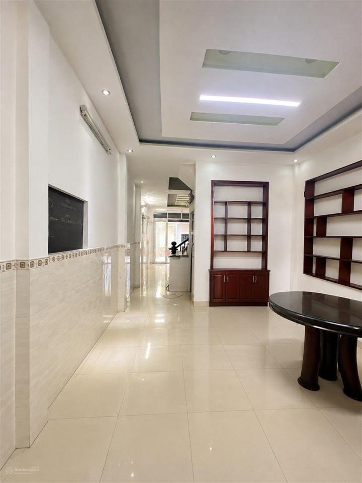 Chợ tân bình  lạc long quan nhqng4 dài 17 xây 4 tâng btct sát mặt tiền