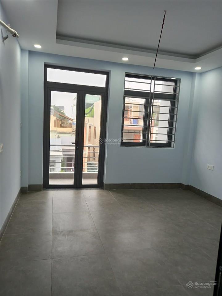 Nhà 2 mặt tiền thông 8m  cây trâm phường 9  4x20m  4 lầu. nhà có thang máy 23 triệu