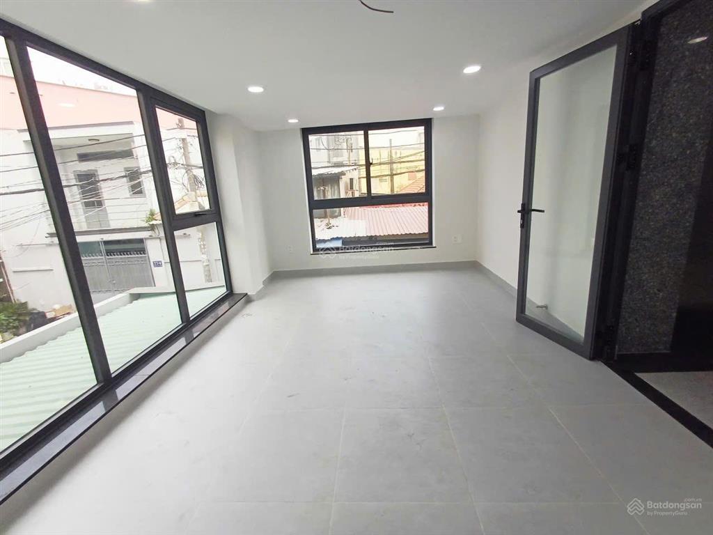 Tòa nhà mới xây góc 2 mặt tiền lê hoàng phái phường 17 dt 7x20m hầm 6 lầu9pn thang máy==60tr