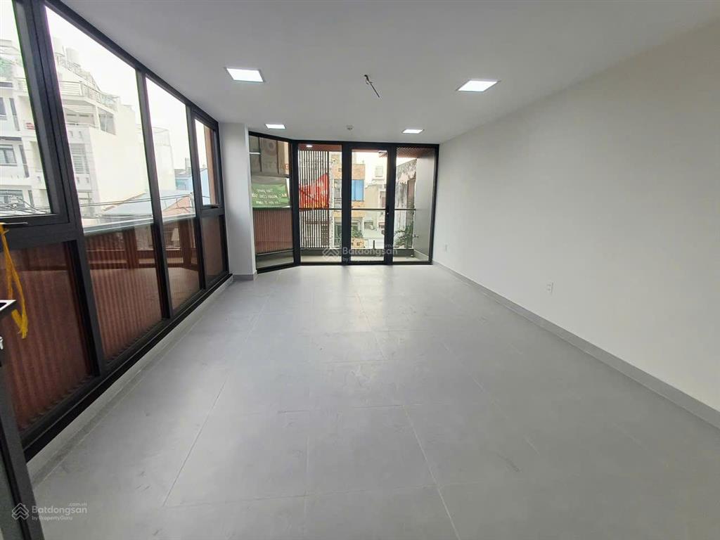 Tòa nhà mới xây góc 2 mặt tiền lê hoàng phái phường 17 dt 7x20m hầm 6 lầu9pn thang máy==60tr
