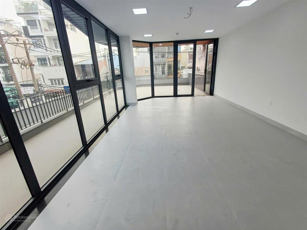Tòa nhà mới xây góc 2 mặt tiền lê hoàng phái phường 17 dt 7x20m hầm 6 lầu9pn thang máy==60tr