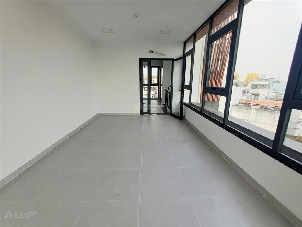 Tòa nhà mới xây góc 2 mặt tiền lê hoàng phái phường 17 dt 7x20m hầm 6 lầu9pn thang máy==60tr