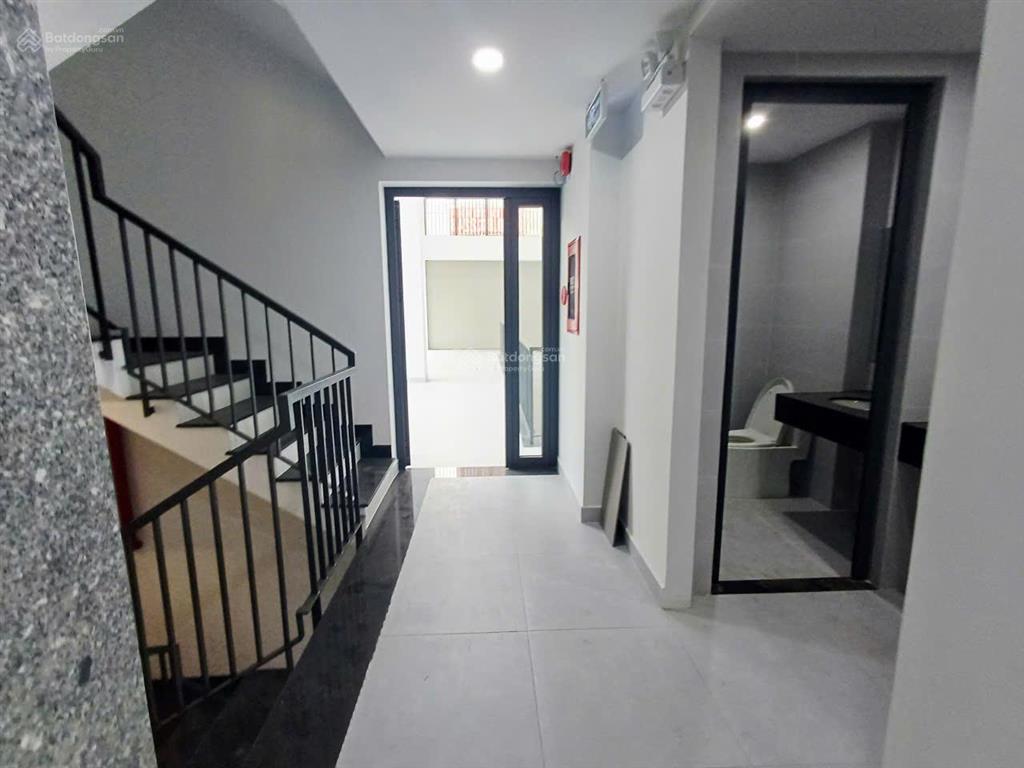 Tòa nhà mới xây góc 2 mặt tiền lê hoàng phái phường 17 dt 7x20m hầm 6 lầu9pn thang máy==60tr