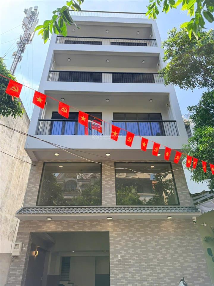 Tòa nhà mới xây đường rộng 8m  gần chợ căn cứ, diện tích 7x15m  5 lầu sàn suốt (có thang máy)