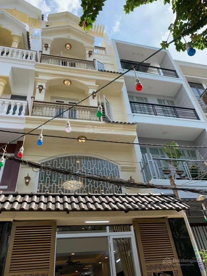 Nhà hẻm 4m quang trung p11 diện tích 4x13m  3 lầu 5pn 3wc = 15 triệu  gần chợ hạnh thông tây