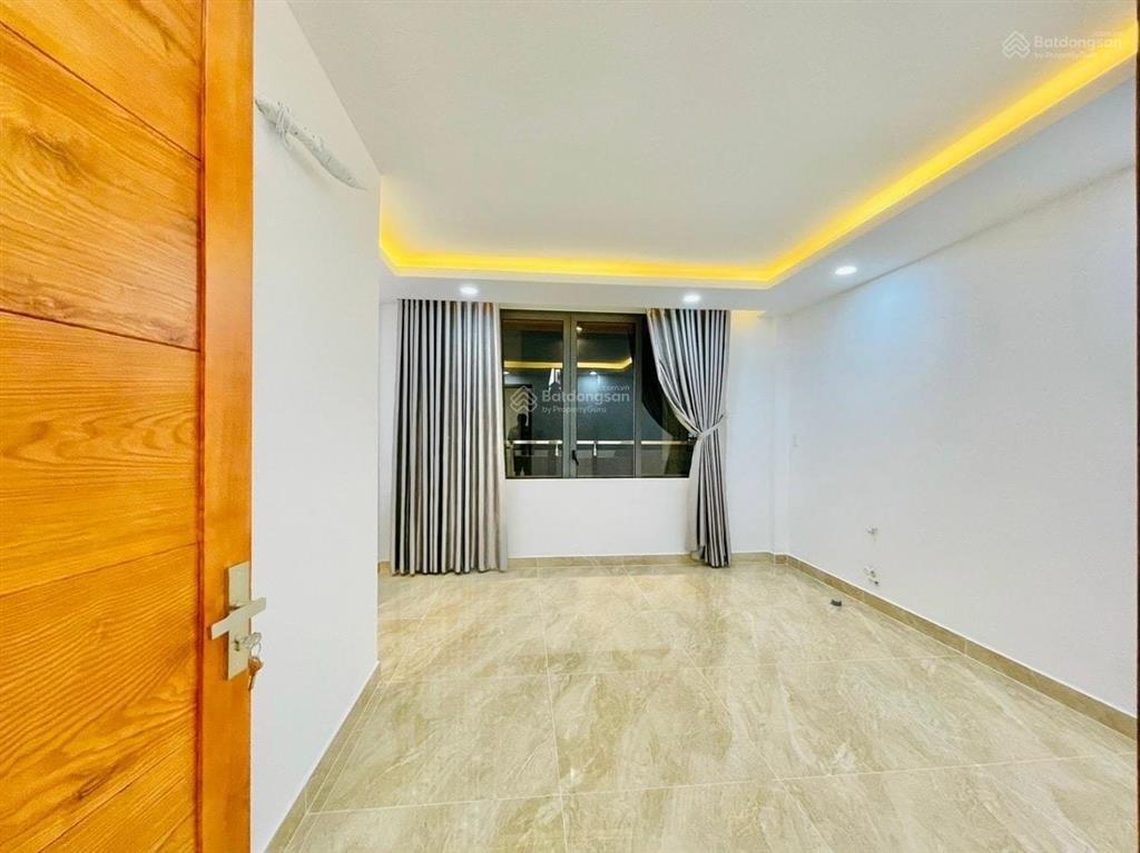 Nhà hẻm 4m quang trung p11 diện tích 4x13m  3 lầu 5pn 3wc = 15 triệu  gần chợ hạnh thông tây
