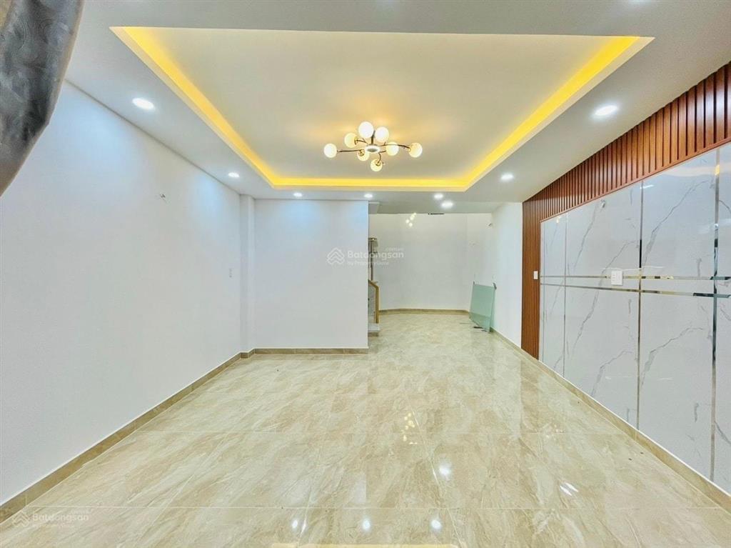 Nhà hẻm 4m quang trung p11 diện tích 4x13m  3 lầu 5pn 3wc = 15 triệu  gần chợ hạnh thông tây