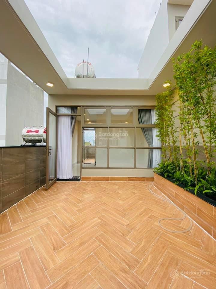 Nhà hẻm 4m quang trung p11 diện tích 4x13m  3 lầu 5pn 3wc = 15 triệu  gần chợ hạnh thông tây