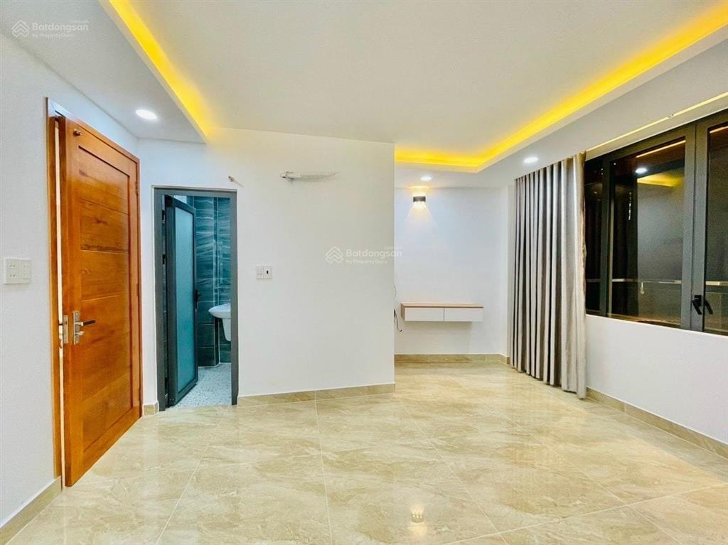 Nhà hẻm 4m quang trung p11 diện tích 4x13m  3 lầu 5pn 3wc = 15 triệu  gần chợ hạnh thông tây
