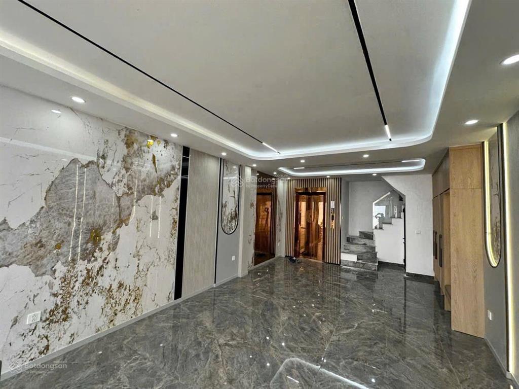 58 m2 7 tầng mt 4,3 m. thang máy. gara 2 ô tô. đường trước nhà ô tô tránh 3 gác