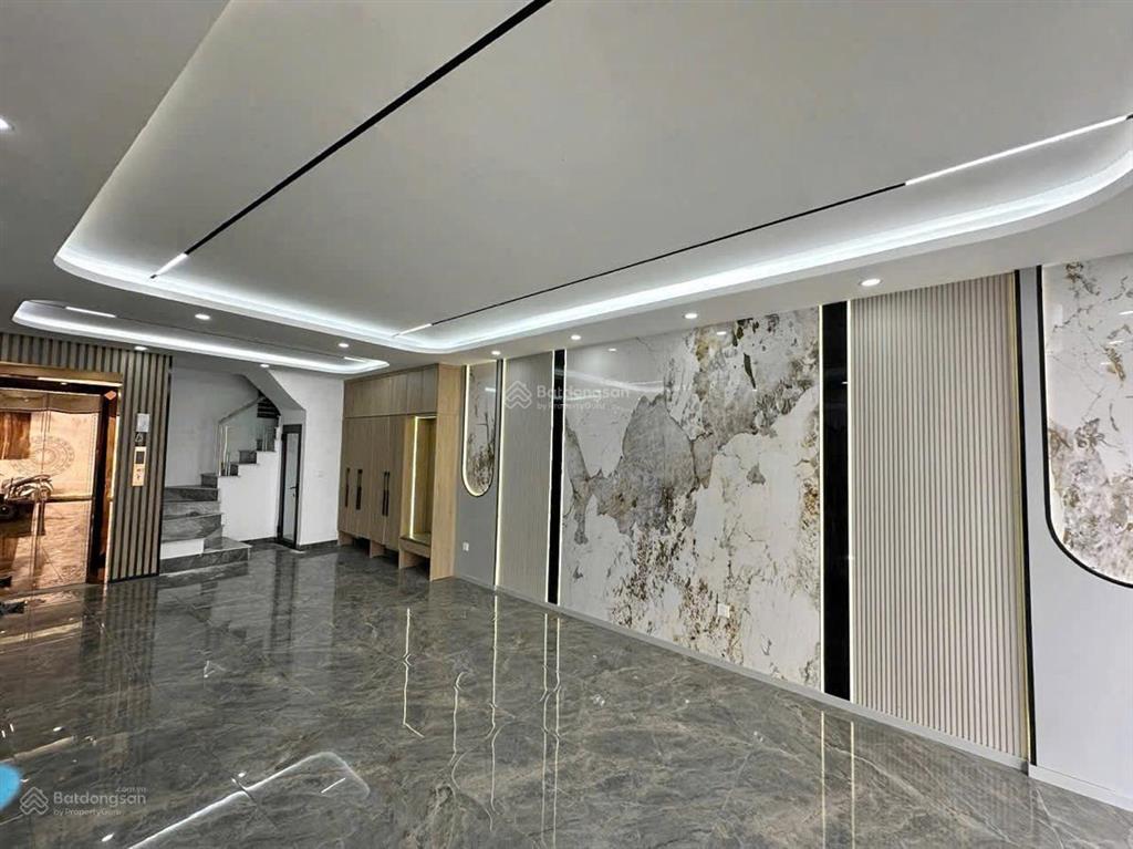 58 m2 7 tầng mt 4,3 m. thang máy. gara 2 ô tô. đường trước nhà ô tô tránh 3 gác