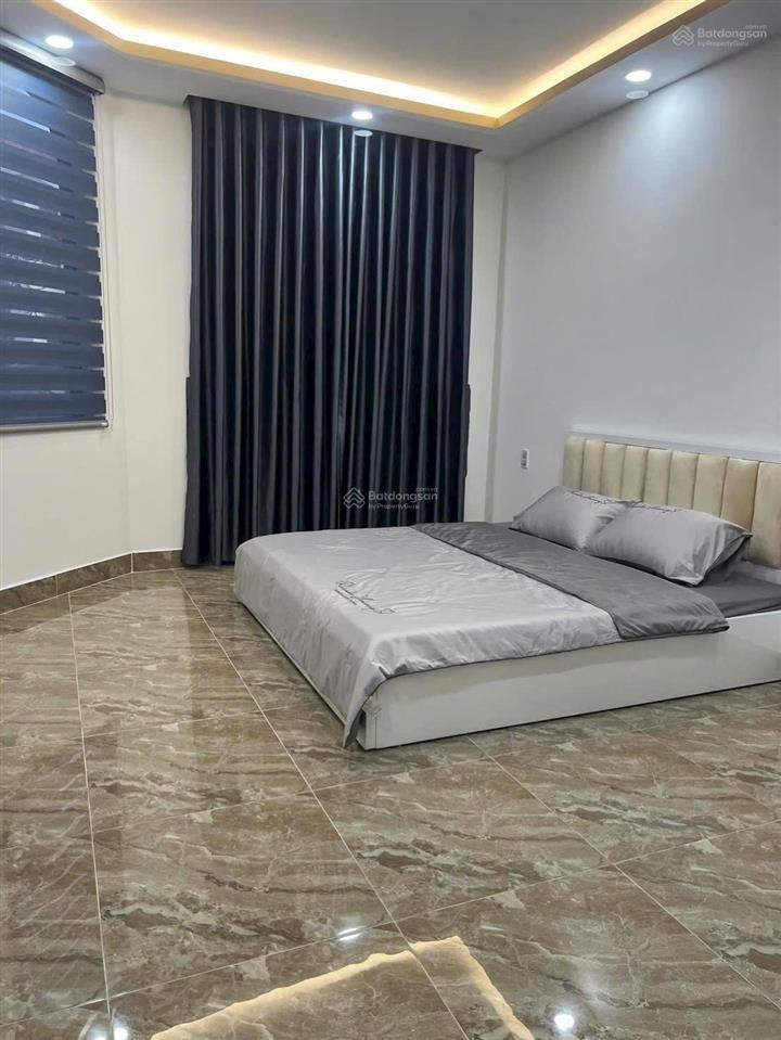 Bán nhà xây mới 100% hẻm xe hơi lê quang định p7 bình thạnh khu vip