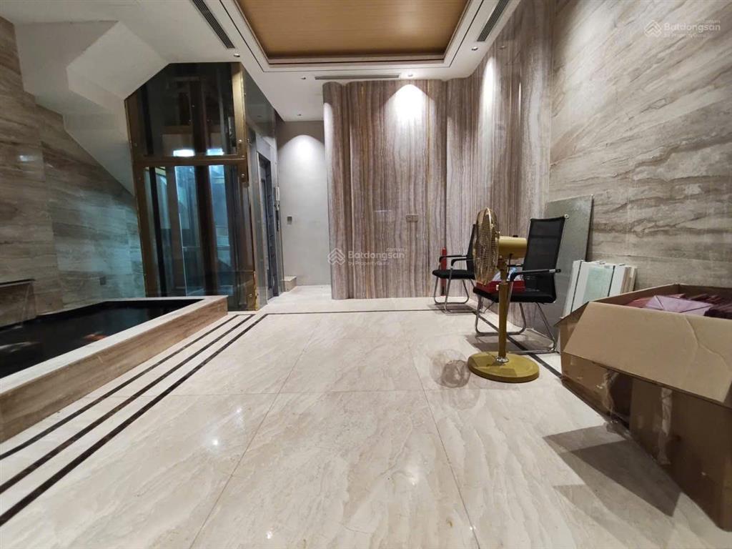 Bán nhà ngõ 104 đào tấn  43m  7 tầng  mặt tiền 6m  vf2 vào nhà  giá 16,8 tỷ