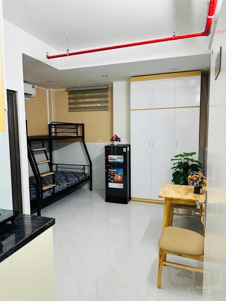 Bán tòa nhà thịnh quang, 50m 5 tầng, thang máy, 9 phòng kk dòng tiền 50 triệu/tháng giá 15 tỷ