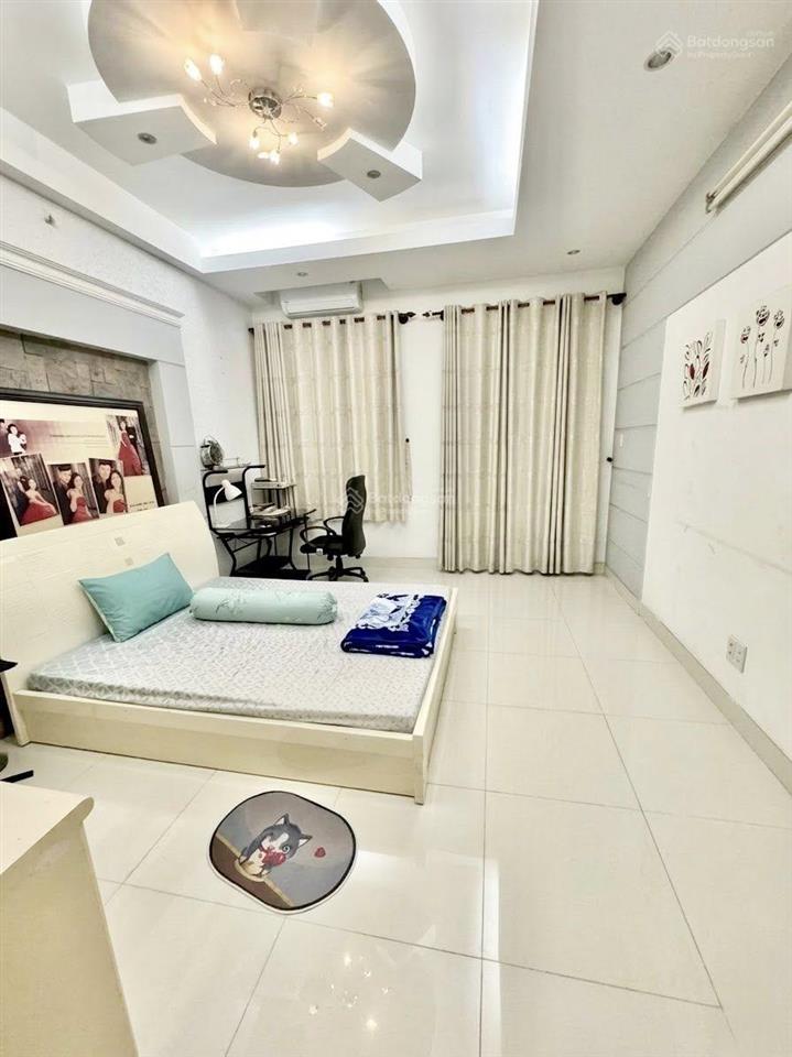 Bán nhà mặt tiền đường 14m khu họ lê, quận tân phú. dt 4x20m, đúc 4 tấm đẹp  giá 11 tỷ còn tl
