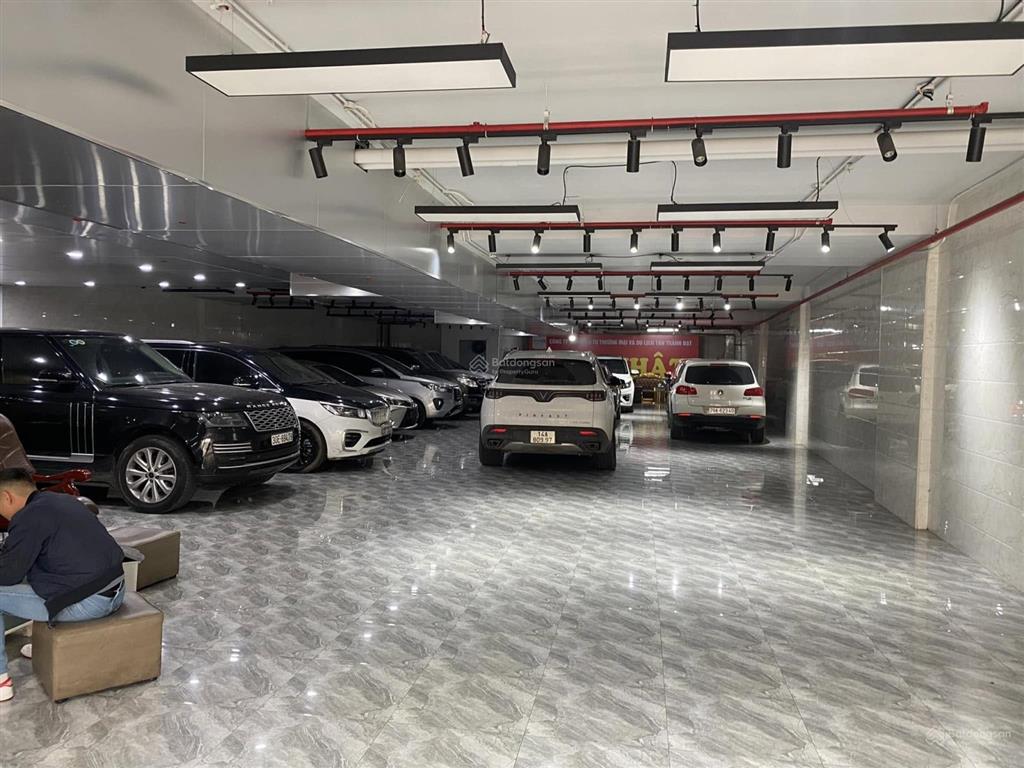 Tòa nhà 15 tầng xây mới mặt phố vip nguyễn phong sắclô góc 4 mặt thoáng588m2 có 2 hầmgiá 600 tỷ