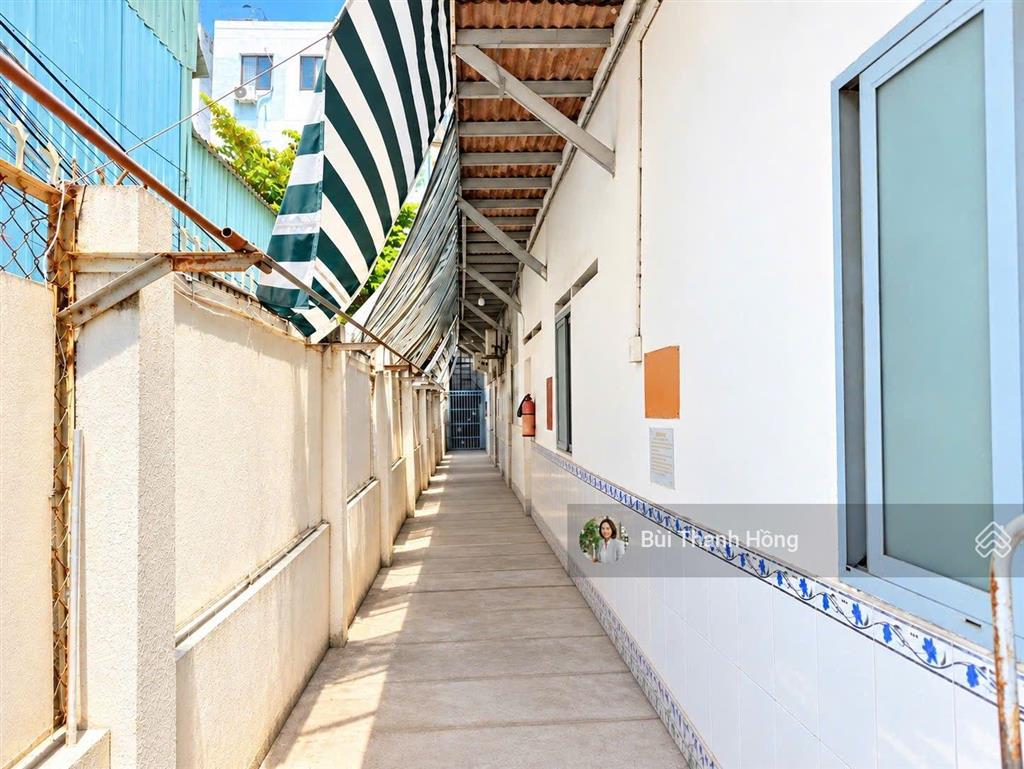 Bán nhà mt nguyễn văn linh, dòng tiền 15 phòng trọ, 171m2, giá 29 tỷ tl