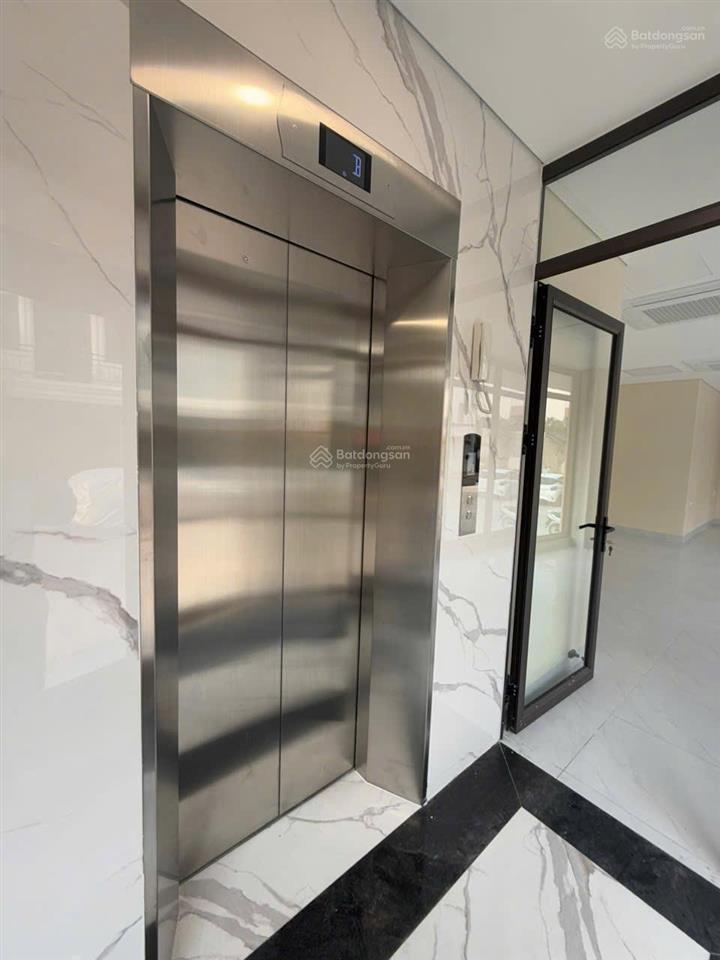 Cho thuê tòa nhà phố thượng thanh 6 tầng thang máy + hầm mặt tiền 12m lô góc 38 triệu/th