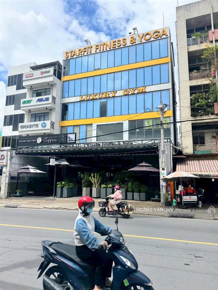 Tòa 7 tầng mt tô ngọc vân ~ 15m*21m = 315m2. dt sàn 1690m2  chợ thủ đức. hđ thuê 200 tr