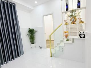 NHÀ MỚI ĐẸP CẠNH MẶT TIỀN TRUNG TÂM TÂN BÌNH, 2 TẦNG KIÊN CỐ 2PN( 1 PN DƯỚI ĐẤT), SỔ