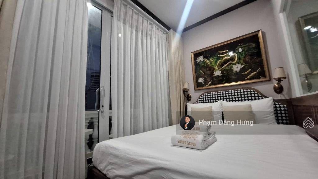 Nhà bình thạnh hẻm oto 6m, sát mặt tiền ngô tất tố, giáp q1, 5 tầng 9pn, 100 triệu/tháng, chỉ 22 tỷ