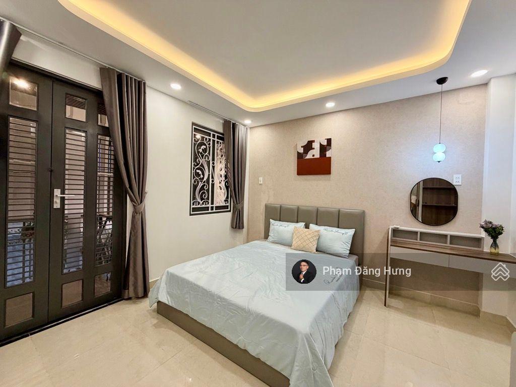 Nhà phú nhuận mới đẹp, 4.1x12m, 4 tầng full nội thất, giáp quận 1, quận 3, sát mt phan đình phùng