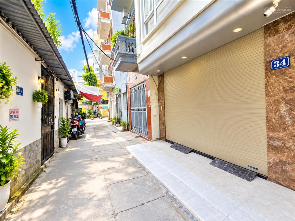 Nhỉnh 11 tỷ  ô tô qua nhà  q. cầu giấy  dt 40m2, 5 tầng, ngõ thông kinh doanh