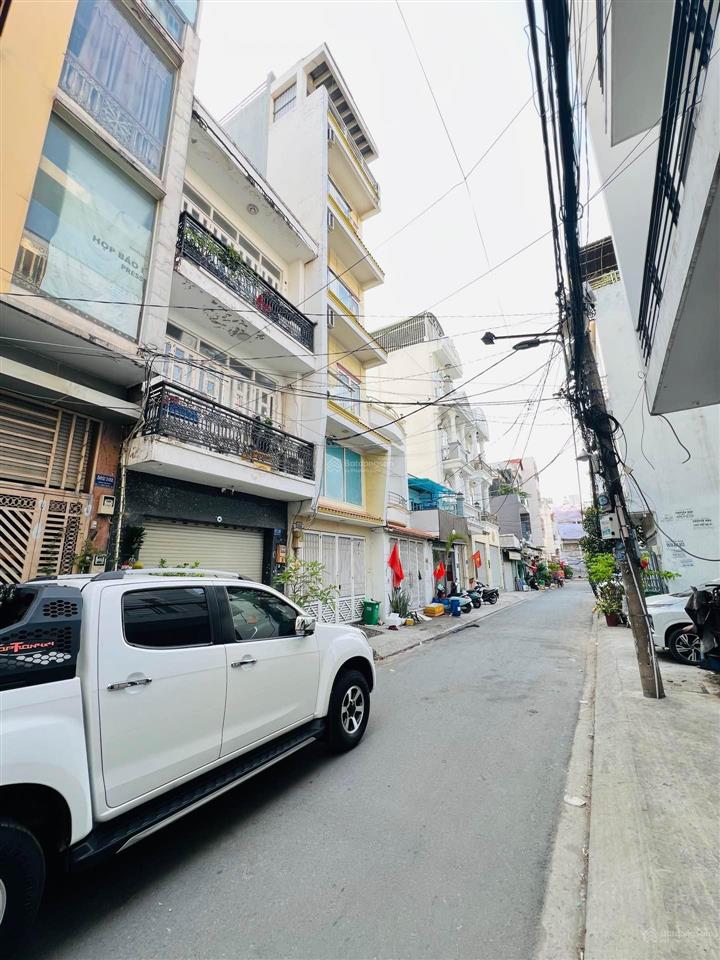Mặt tiền kinh doanh  6m5 dài 15m  2 tầng  xe hơi trong nhà  10 tỷ nhỉnh