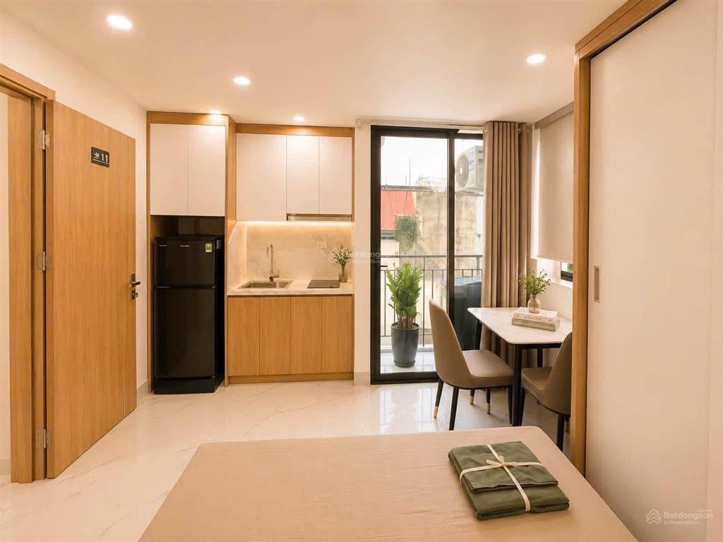 Rất gấp! toà ccmn nguyễn khang, 68m2*6t*15pkk, dt ~1tỷ/năm, 100m ra phố, thang máy, pccc chuẩn