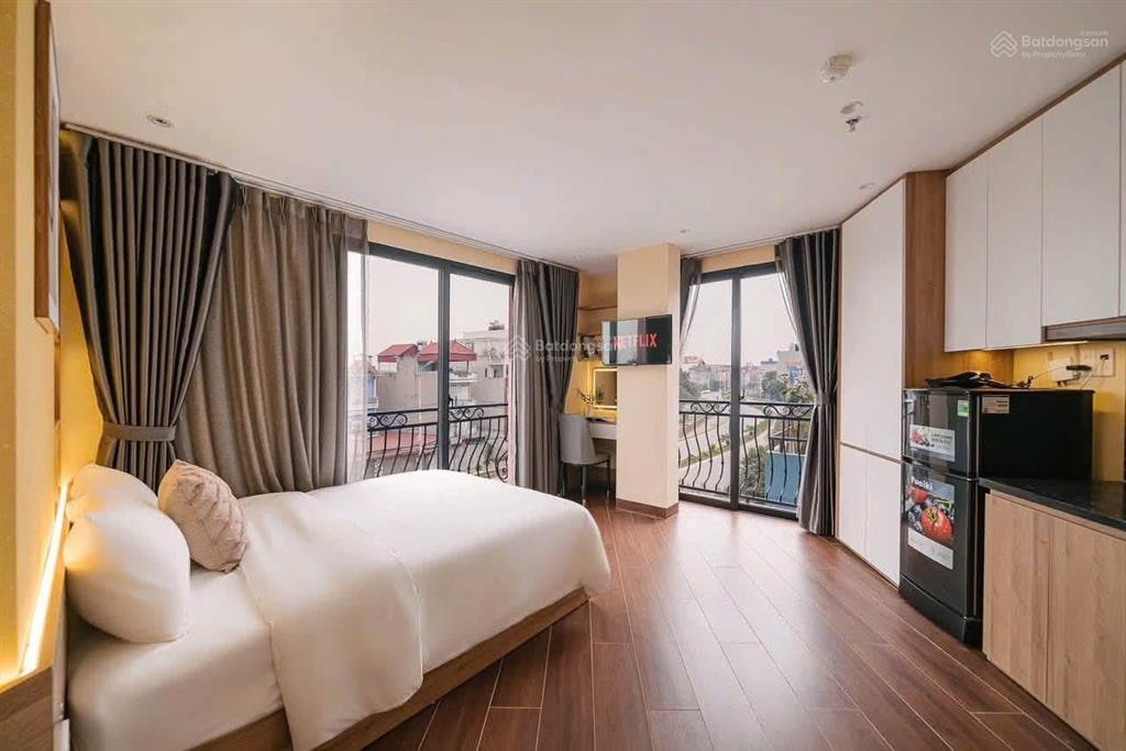 Phố vip trung kính! toà chdv 72m2*6t*12pkk, dt~900tr/năm, ngõ thông, 100m ra phố, pccc đạt chuẩn