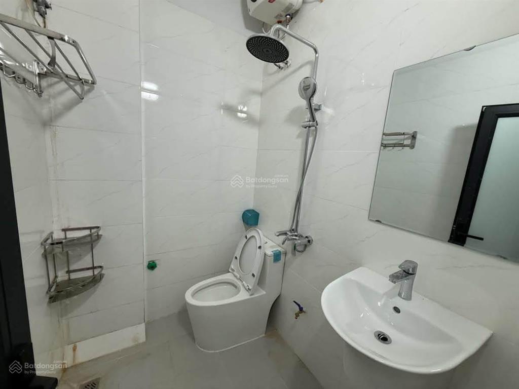 Sau nhà mặt phố phương mai 39m2x6t kd dân xây chắc chắn 2 thoáng sổ đỏ cc có tl