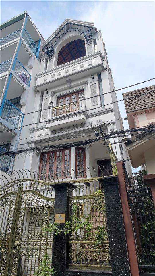 Tòa nhà 4 tầng 12 phòng (5x20m), có thang máy. dòng tiền 1,2 tỷ/năm. cách sân bay 600m  21,5 tỷ