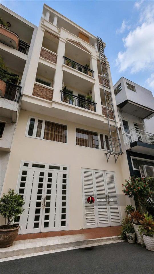 Bán nhà 6 tầng thang máy (6,5x17m). 18 phòng full nội thất. đường nhựa 8m lê văn sỹ  23 tỷ tl