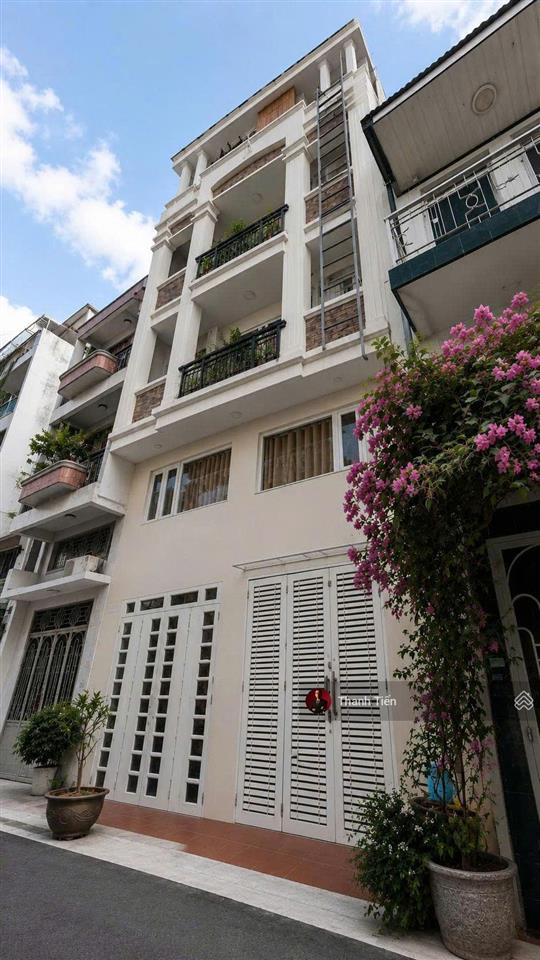 Bán nhà 6 tầng thang máy (6,5x17m). 18 phòng full nội thất. đường nhựa 8m lê văn sỹ  23 tỷ tl