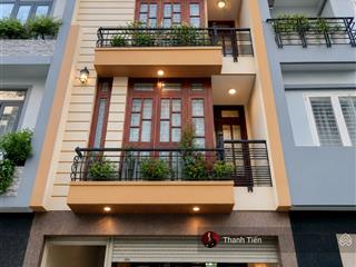 Bán nhà mới đẹp. hầm + 4 tầng. bề ngang 4,5m rộng rãi. mặt tiền đường hoa lan sát phan xích long