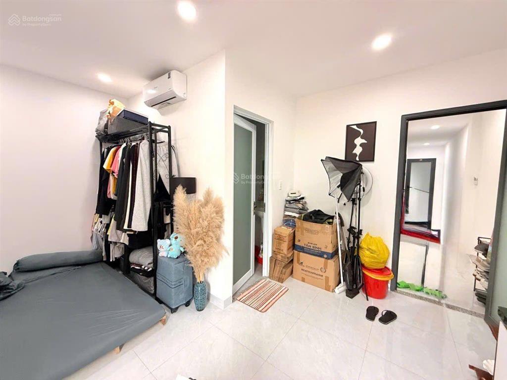 Nhà 4 tầng đường f2, kdc tân tiến, phường tân thới hiệp, q12, dt 100m2 (5mx20m). dòng tiền 25tr/th