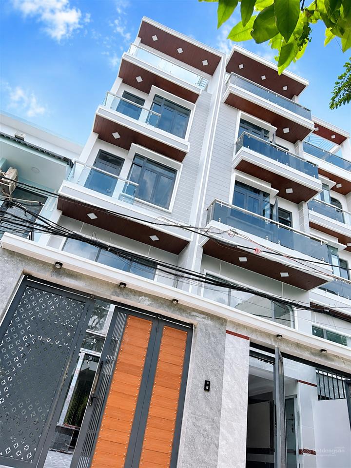 Nhà mới thiết kế hiện đại có thang máy gần ngay trường trần quốc toản  tt q9 cũ