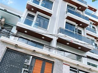 Nhà mới thiết kế hiện đại có thang máy gần ngay trường trần quốc toản  tt q9 cũ