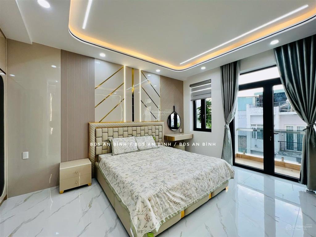 Bán dãy nhà phố liền kề 818 lê trọng tấn. (4m*20m  9tỷ400), đường nhựa 12m, 2 oto tránh nhau