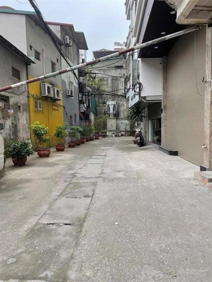 Bán nhà 7t thang máy mới pl hào nam cát linh 55m2 ô tô đỗ giá 25,8 tỷ.