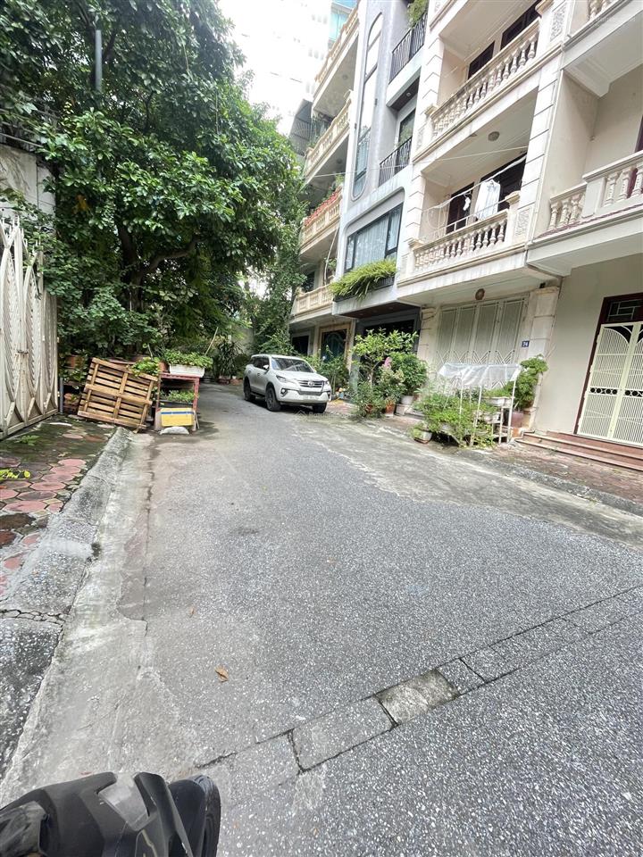 Bán nhà 7t thang máy mới pl hào nam cát linh 55m2 ô tô đỗ giá 25,8 tỷ.