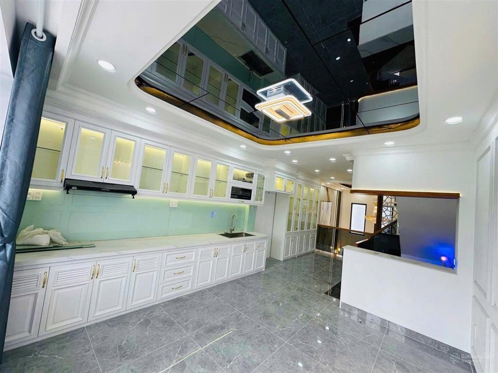 Nhà 4 lầu hẻm xe hơi đường đinh thị thi giáp khu vạn phúc, 18 triệu/tháng