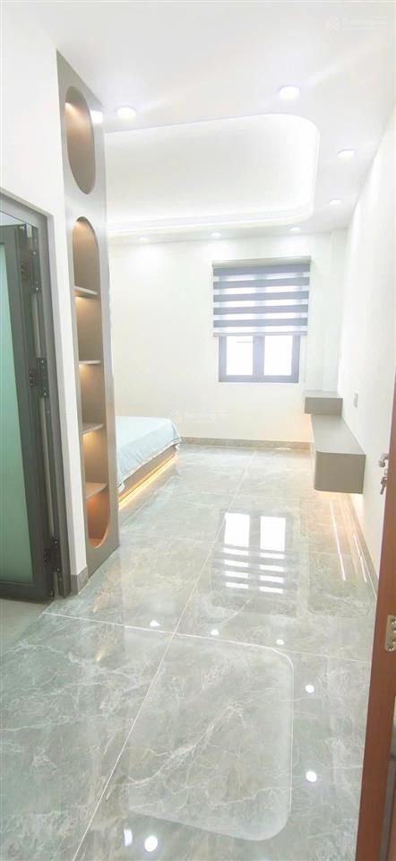 Bán nhà xây mới có thang máy 5x19m. xây 1 lửng 3 lầu trục đường lê thị riêng, phường thới an, q12