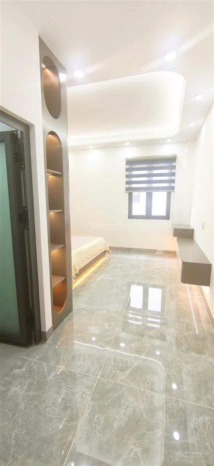 Bán nhà xây mới có thang máy 5x19m. xây 1 lửng 3 lầu trục đường lê thị riêng, phường thới an, q12