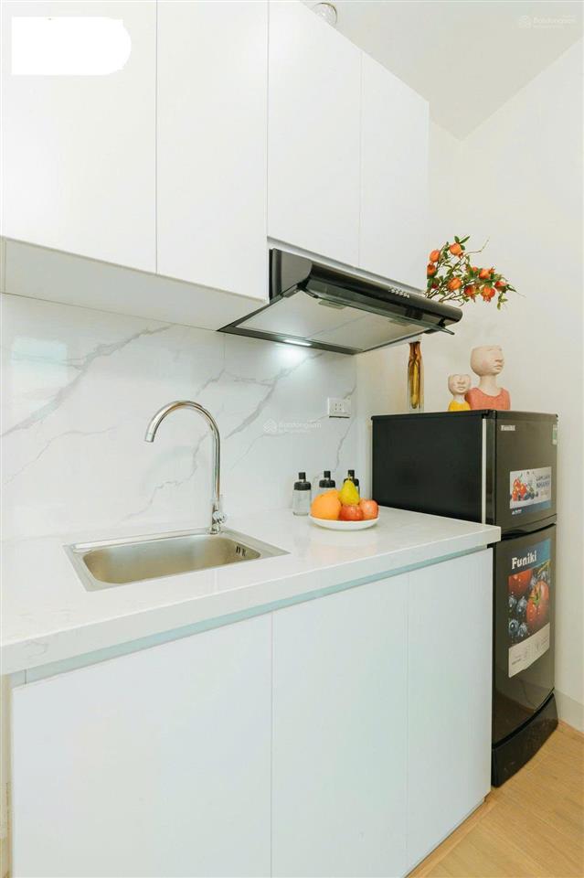 Bán tòa chung cư mini thịnh quang 14 phòng, dt 70tr/th, 2 thoáng, 40m ra ô tô, full pccc, 70m