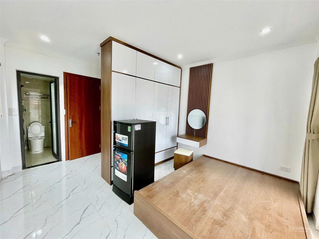 Tòa chung cư mini hoàng hoa thám, 3 thoáng, 14 phòng 1n1k, dt 1.1 tỷ, ngõ thông, gần phố, 60m2