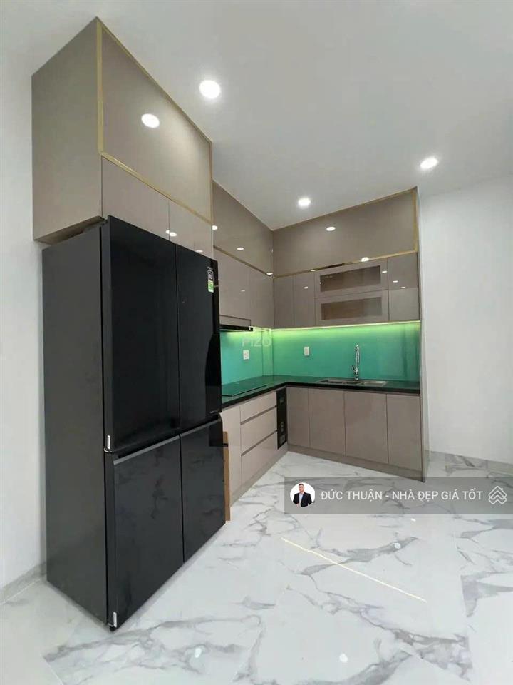 Hẻm xe hơi  nguyễn văn đậu, phú nhuận. dt (4mx10m)  5 tầng. nhà mới, đẹp  vào ở ngay. chỉ 9,5tỷ