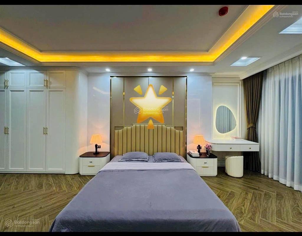Bán nhà riêng tại phố hào nam gần ga cát linh gara ôtô 7 tầng thang máy kinh doanh 65m, giá 24,8tỷ