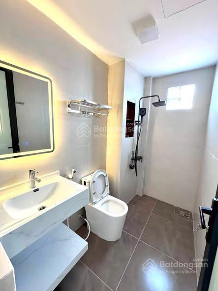 Bán nhà 7 tầng thang máy phan phù tiên đống đa 2 thoáng cách phố 100m giá hơn 9 tỷ
