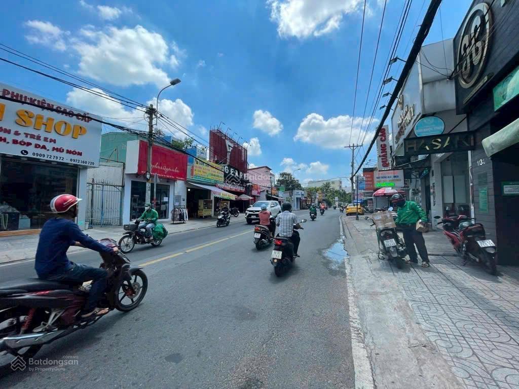 Mặt tiền kinh doanh dt 100m2 đường nhựa vỉa hè 10m, ctxd 1 hầm 5 tầng, đang cho thuê, giá 9,x tỷ
